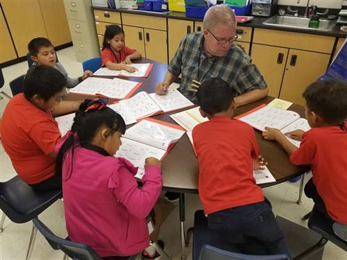 students work in a small group